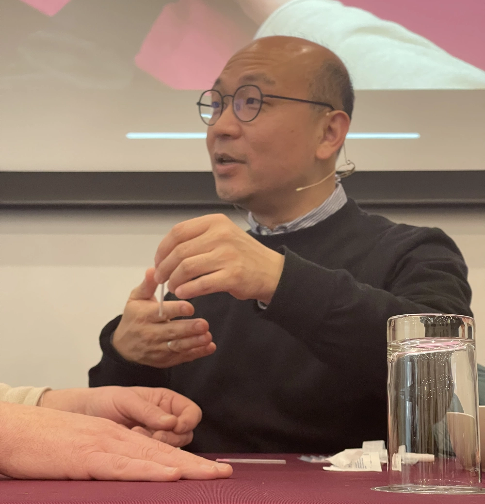 Dr Michael Chung demonstrating Tung's Acupuncture techniques