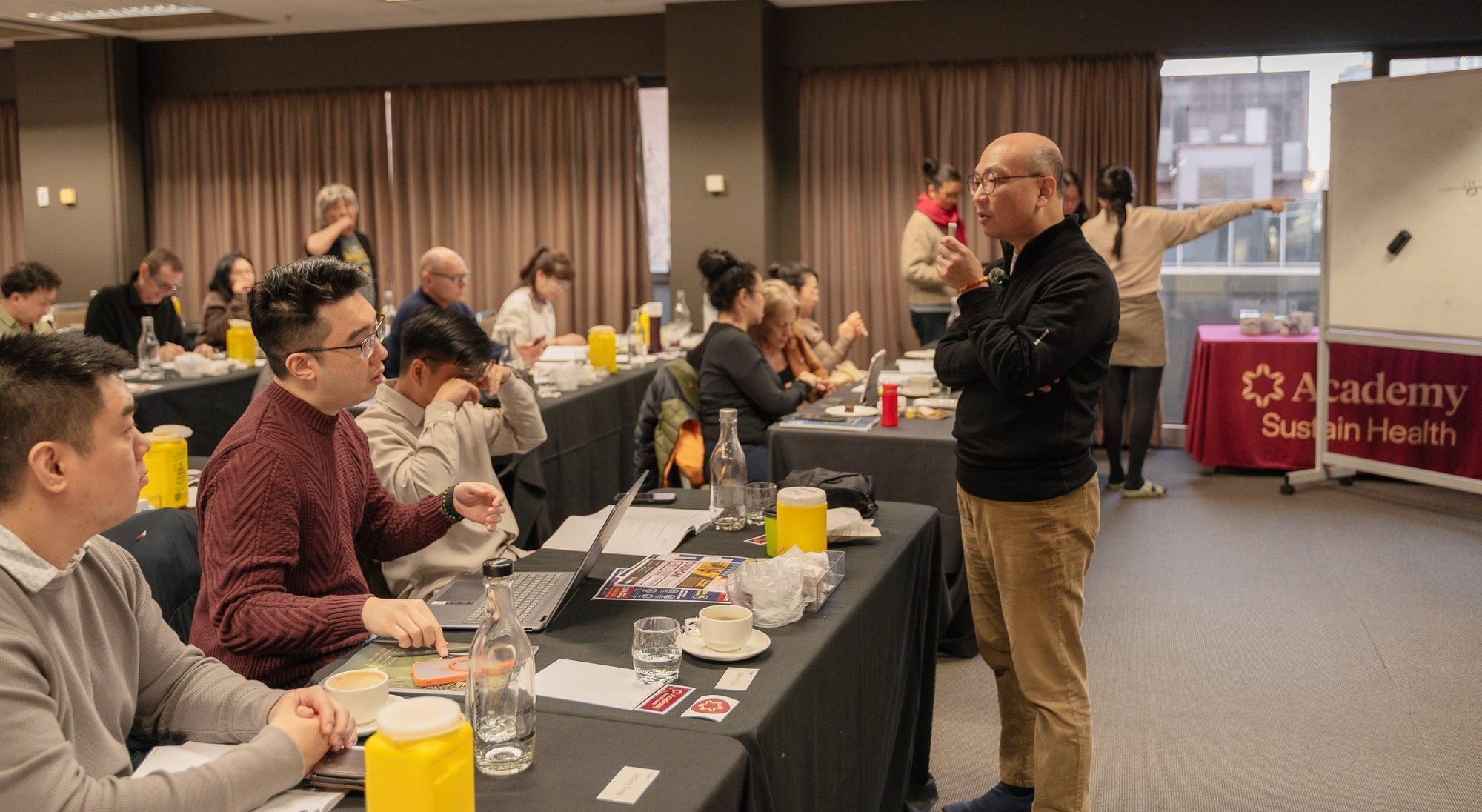 Dr Michael Chung demonstrating Tung's Acupuncture techniques
